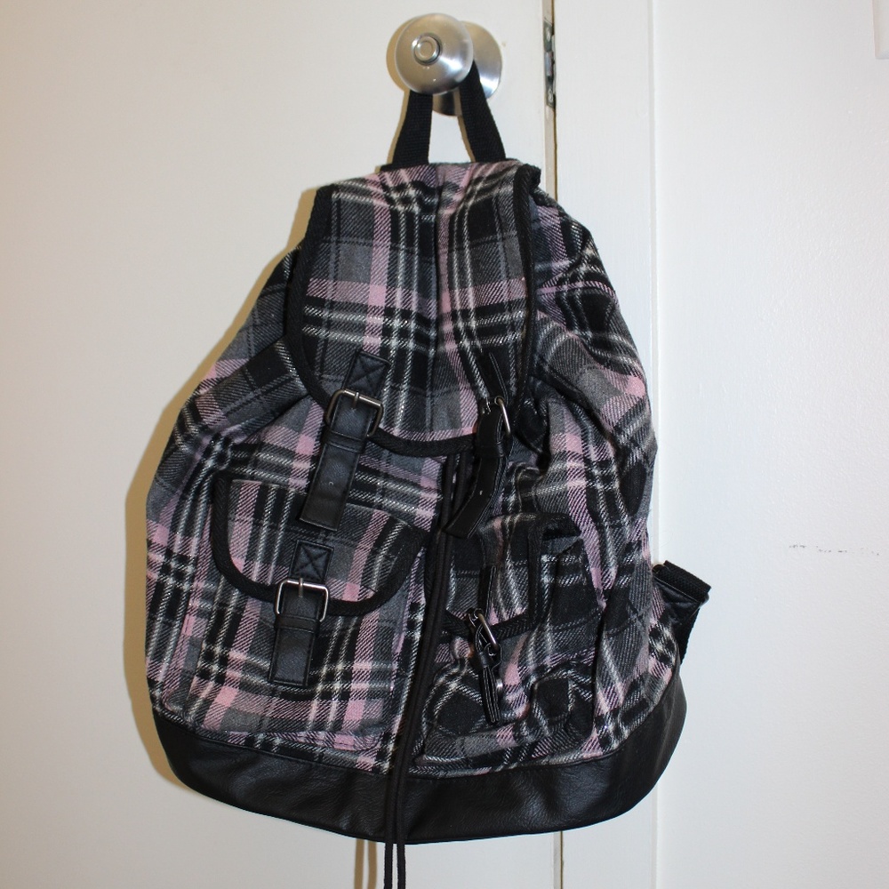 Candies pink, silver, and black bucket backpack